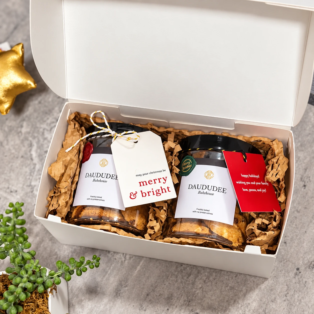 Christmas cookie gift box with festive gift tags