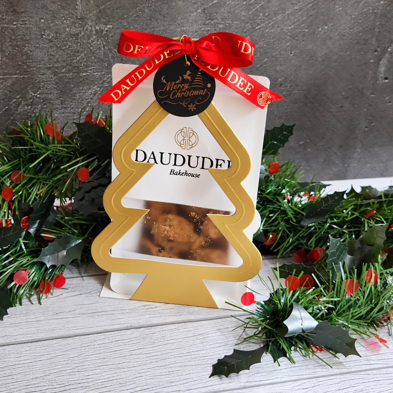 Gold Christmas tree cookie pouch with ribbon and gift tag