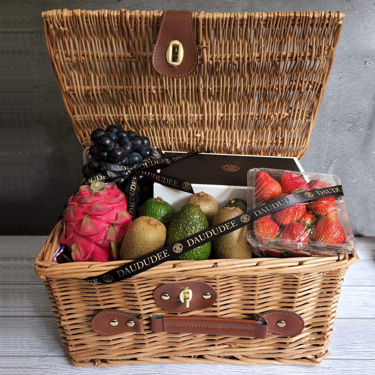 Fruit and cookie hamper in a keepsake wicker basket