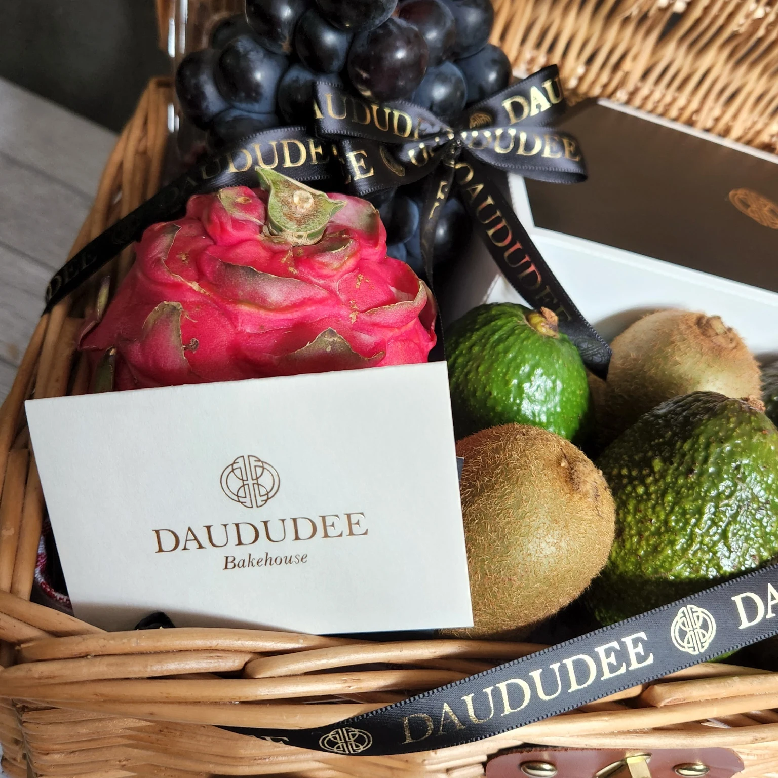 Fruit hamper with branded ribbon and gift card