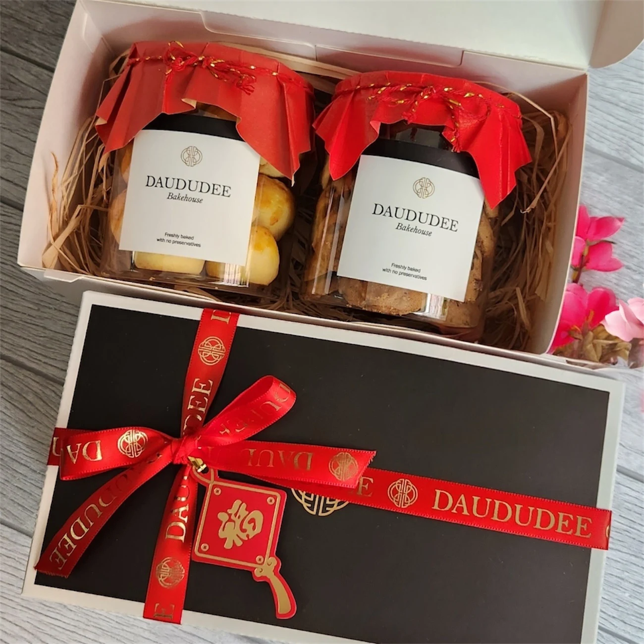 Lunar New Year gift box with two festive cookie jars